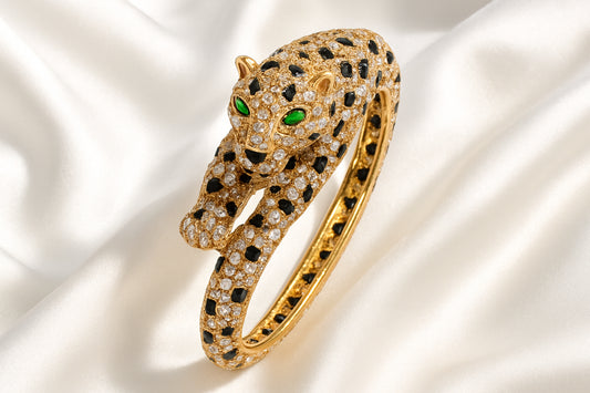 Cartier Panthère diamond and emerald bangle — authentication guide by Spectra Fine Jewelry