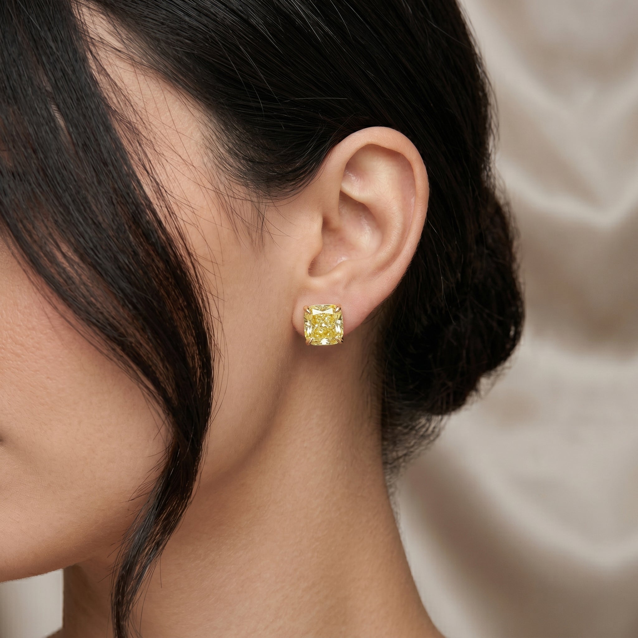 7.77 & 7.92 ct. Fancy Yellow Cushion Diamond Stud Earrings in 18k Gold | Spectra